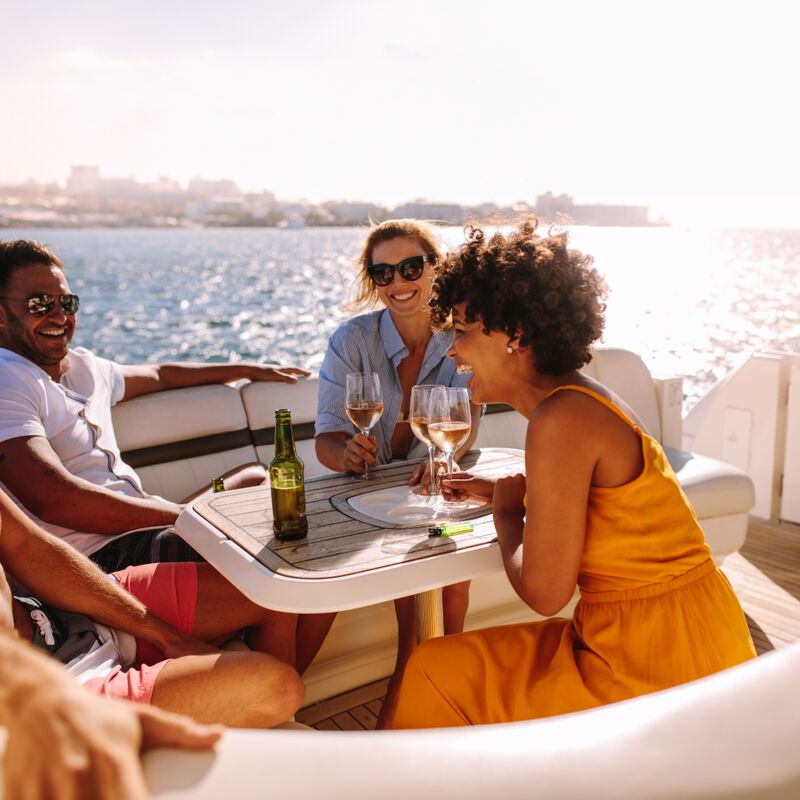 People enjoying drinks on a boat