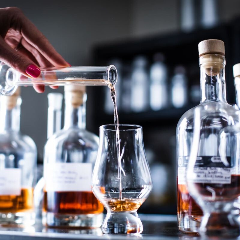 Bourbons being poured into glasses