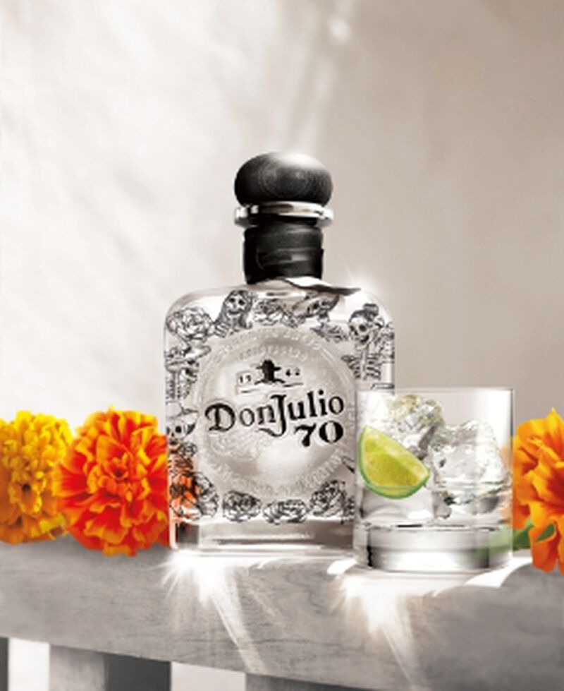 Bottle of Don Julio 70, a rew release item, with a cocktail