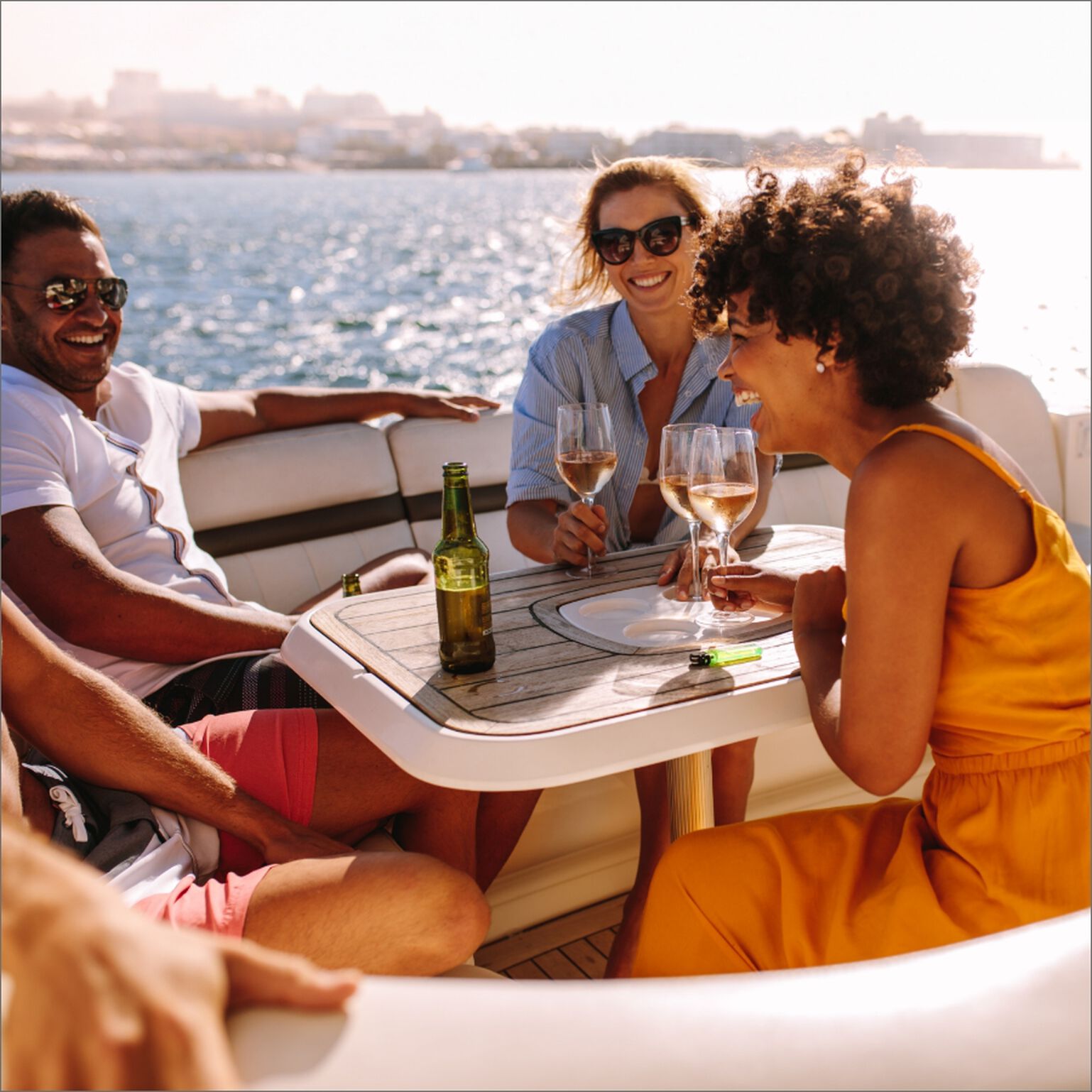 People enjoying wine on a boat