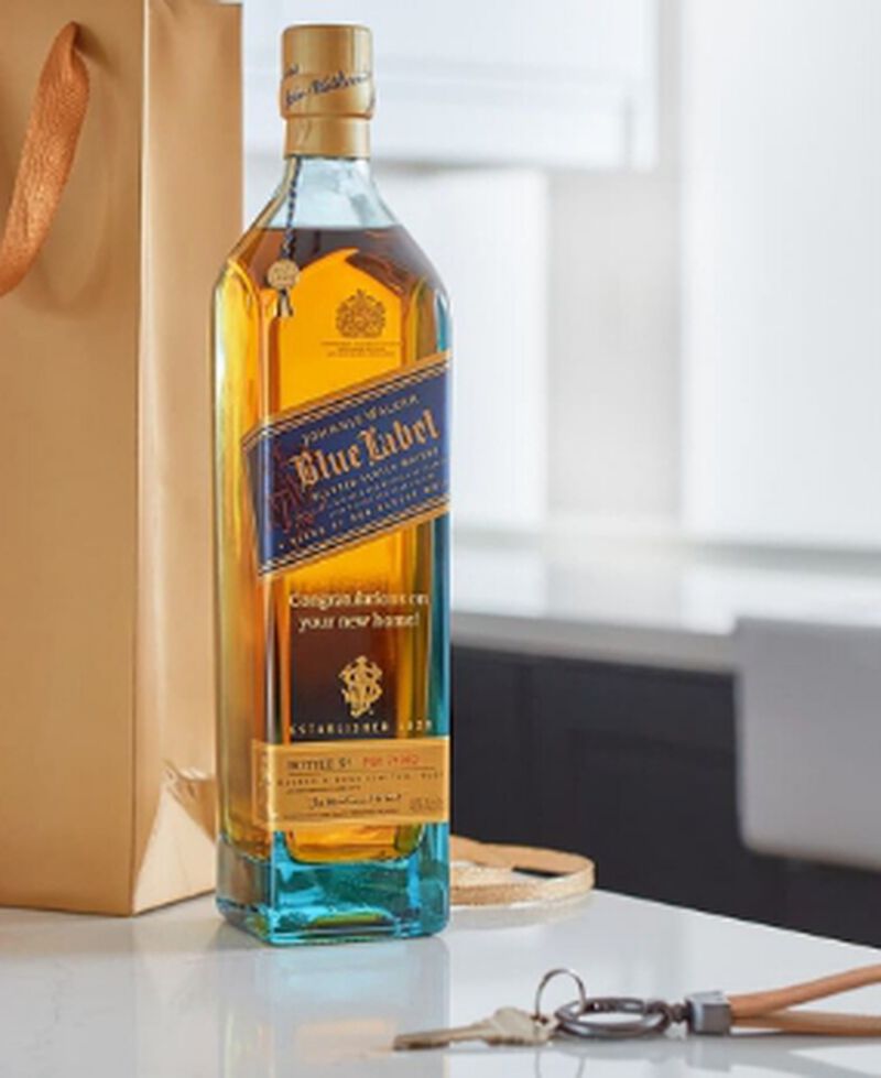A bottle of Johnnie Walker Blue, The Best Closing Gifts For Real Estate Agents And Clients