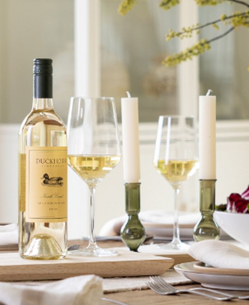 Bottle of Duckhorn Vineyards North Coast Sauvignon Blanc with wine glasses