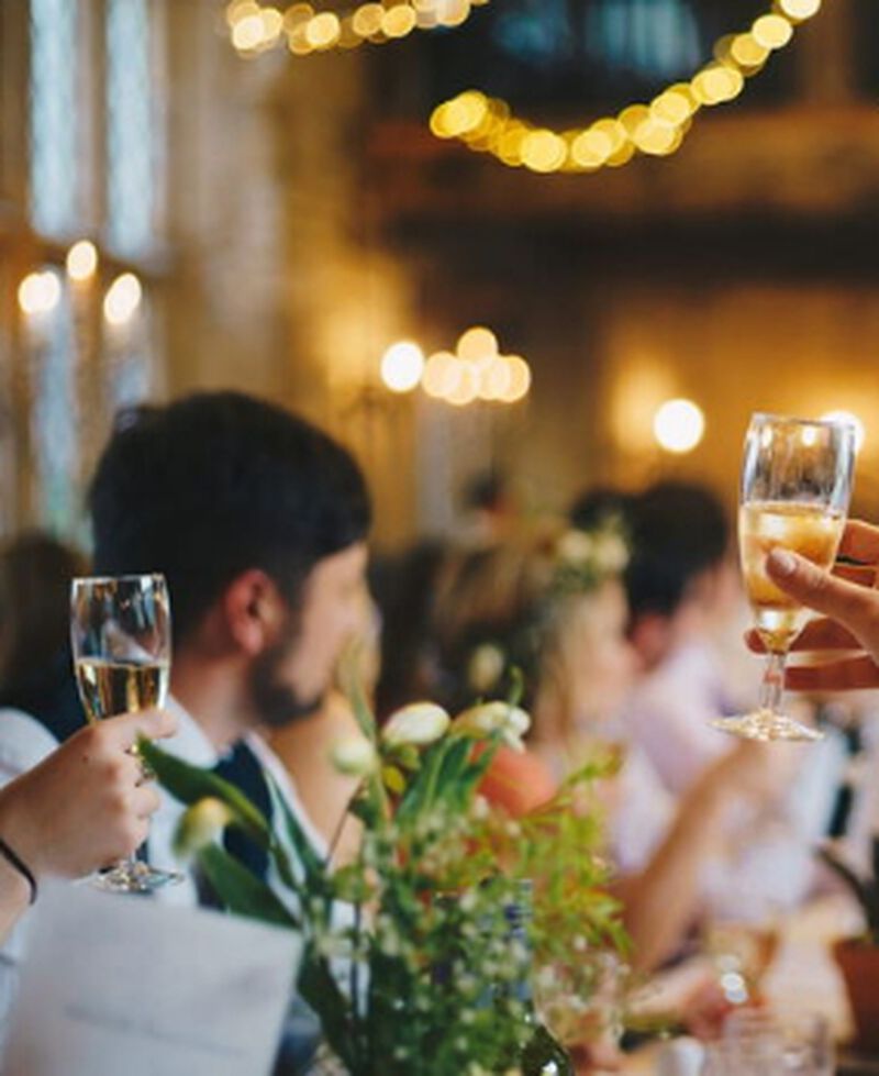 People toasting champagne at a wedding
